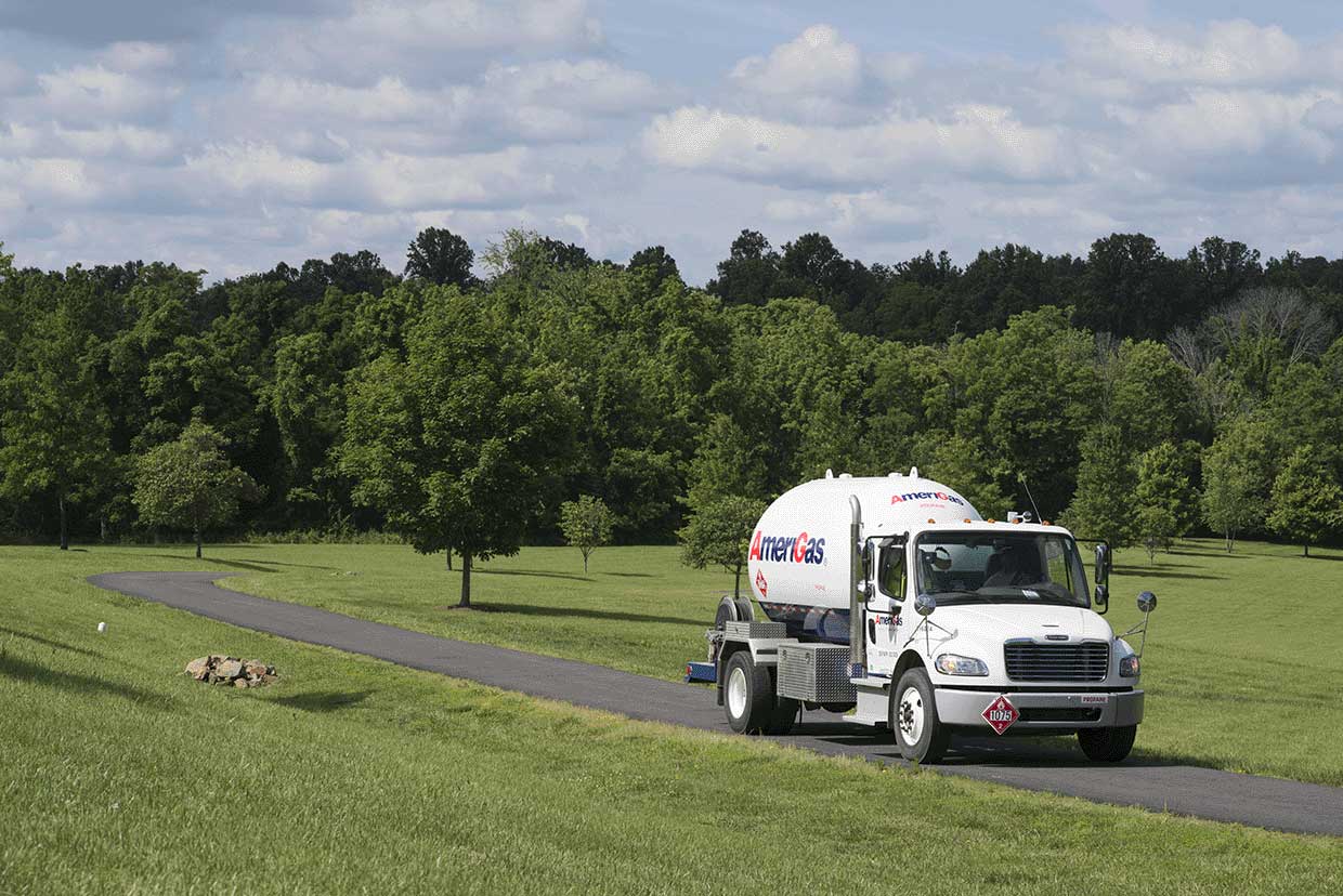 AmeriGas Propane truck driving down farm driveway