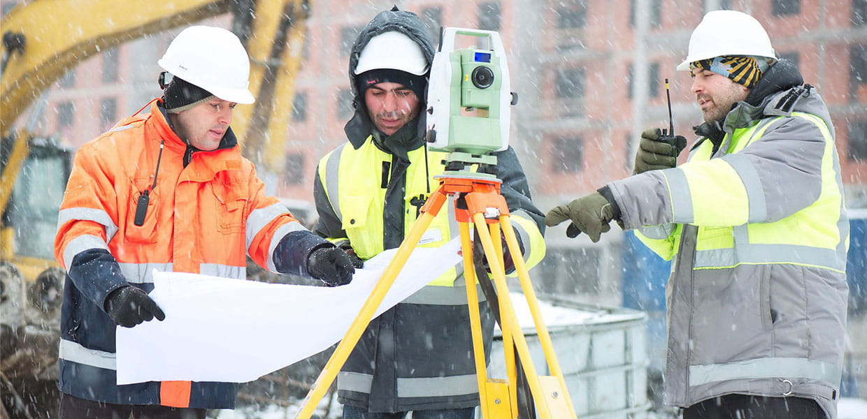 Construction crew looking at plans.