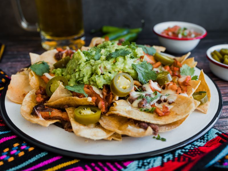 Grilled Super Supreme Nachos with Quacamole